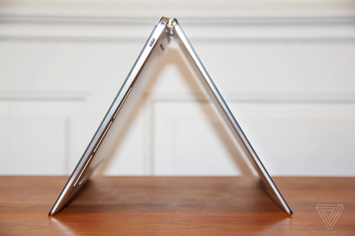 The Dell XPS 13 2-in-1 in tent mode, from the left side.
